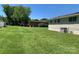 Spacious backyard with a large grassy area at 9408 Sandburg Ave, Charlotte, NC 28213