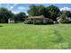 Brick ranch home with a large backyard and detached shed at 9408 Sandburg Ave, Charlotte, NC 28213