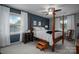 Bedroom with a four-poster bed and blue accent wall at 634 Carson Rd, Gastonia, NC 28052