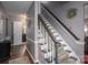 Gray painted interior stairway with carpeted steps at 634 Carson Rd, Gastonia, NC 28052