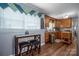 Kitchen with wood cabinets, stainless steel appliances, and breakfast bar at 634 Carson Rd, Gastonia, NC 28052