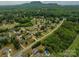 Aerial view showcasing home, large lot, and surrounding neighborhood at 634 Carson Rd, Gastonia, NC 28052