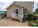 Back exterior with steps leading to a private entrance at 634 Carson Rd, Gastonia, NC 28052