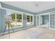 Sunroom with access to backyard and plenty of natural light at 909 Shinnville Rd, Mooresville, NC 28115