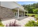 Covered patio with brick and concrete flooring at 909 Shinnville Rd, Mooresville, NC 28115