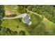 Aerial view showing house and expansive green space at 909 Shinnville Rd, Mooresville, NC 28115