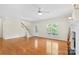 Spacious living room featuring hardwood floors and a fireplace at 909 Shinnville Rd, Mooresville, NC 28115