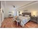 Main bedroom with hardwood floors, sitting area, and private door at 115 Anson Dr, China Grove, NC 28023