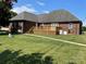 Brick home with a deck and spacious backyard at 115 Anson Dr, China Grove, NC 28023