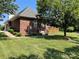 Brick home with a deck and large backyard at 115 Anson Dr, China Grove, NC 28023