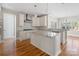 Modern kitchen featuring white cabinets and granite countertops at 101 Mcalway Rd, Charlotte, NC 28211