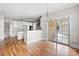 Bright dining area with hardwood floors and access to a patio at 101 Mcalway Rd, Charlotte, NC 28211