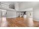 Open concept great room with hardwood floors, high ceilings, and kitchen views at 101 Mcalway Rd, Charlotte, NC 28211
