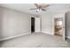 Spacious bedroom with ceiling fan and access to a bathroom at 101 Mcalway Rd, Charlotte, NC 28211