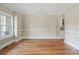 Bright dining room features hardwood floors, wainscoting, and a chandelier at 101 Mcalway Rd, Charlotte, NC 28211