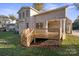 House back view with brick exterior and wooden deck at 101 Mcalway Rd, Charlotte, NC 28211