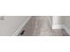 Hallway with gray carpeting and white baseboards at 101 Mcalway Rd, Charlotte, NC 28211
