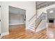 Elegant entryway with hardwood floors and a staircase leading to the upper level at 101 Mcalway Rd, Charlotte, NC 28211