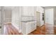 White kitchen cabinets and granite countertops at 101 Mcalway Rd, Charlotte, NC 28211