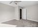 Bright bedroom with carpeted floor and neutral walls at 101 Mcalway Rd, Charlotte, NC 28211