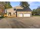 House exterior showcasing a two-car garage and driveway at 101 Mcalway Rd, Charlotte, NC 28211