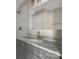 Bathroom vanity with granite countertop and tiled shower at 101 Mcalway Rd, Charlotte, NC 28211