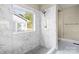 Large walk-in shower with marble tile and window at 101 Mcalway Rd, Charlotte, NC 28211