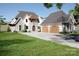 Stunning two-story home with a three-car garage and lake views at 108 Sail High Ct, Mooresville, NC 28117
