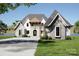 Stunning two-story home with a charming facade and landscaped yard at 108 Sail High Ct, Mooresville, NC 28117