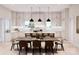 Modern kitchen with white cabinets, an island and breakfast bar at 108 Sail High Ct, Mooresville, NC 28117