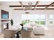 Bright and airy living room with fireplace and lake views at 108 Sail High Ct, Mooresville, NC 28117