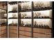 Custom wine cellar with ample space for bottles and glasses at 108 Sail High Ct, Mooresville, NC 28117
