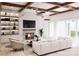 Spacious living room with a fireplace and built-in shelving at 108 Sail High Ct, Mooresville, NC 28117