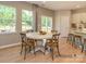 Casual breakfast nook with round table and chairs near kitchen at 4552 Potters Wheel Dr, Fort Mill, SC 29715