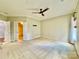 Spacious bedroom with ceiling fan and carpet at 422 Bougainvillea Ct, Monroe, NC 28110