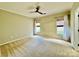 Bright bedroom with two windows and ceiling fan at 422 Bougainvillea Ct, Monroe, NC 28110