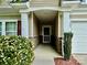 Front entry with stone accents and landscaping at 422 Bougainvillea Ct, Monroe, NC 28110