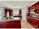 Modern kitchen featuring stainless steel appliances and rich wood cabinetry at 422 Bougainvillea Ct, Monroe, NC 28110