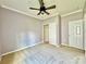 Spacious bedroom with ceiling fan and neutral walls at 422 Bougainvillea Ct, Monroe, NC 28110