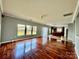 Spacious living room with hardwood floors and kitchen access at 422 Bougainvillea Ct, Monroe, NC 28110