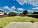 Fenced backyard with lawn, patio and landscaping at 422 Bougainvillea Ct, Monroe, NC 28110