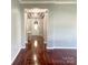 Bright entryway with hardwood floors and console table at 422 Bougainvillea Ct, Monroe, NC 28110