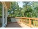 Wooden deck with view of backyard and trees at 2594 Cedar Valley Dr, Conover, NC 28613