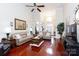 Open living room with hardwood floors, neutral decor, and ample natural light at 3617 Venetian Way, York, SC 29745