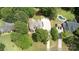 Aerial view of a house and neighborhood with pool and lush landscape at 3617 Venetian Way, York, SC 29745