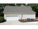 House exterior showcasing a white garage door and HVAC units at 3617 Venetian Way, York, SC 29745