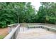 Spacious deck with built-in seating overlooks a wooded area at 3617 Venetian Way, York, SC 29745