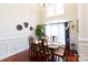 Formal dining room with hardwood floors, a large table, and abundant natural light at 3617 Venetian Way, York, SC 29745