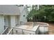 Spacious deck with grey railings overlooking a wooded area at 3617 Venetian Way, York, SC 29745
