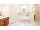 Elegant bathroom with a soaking tub, shower, and double vanity at 3617 Venetian Way, York, SC 29745